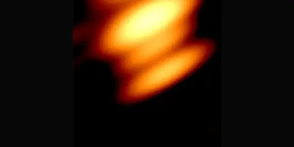 Astronomers Capture First Image of Two Orbiting Black Holes