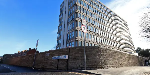 Central Bank Manager Faces Allegations of Unlawful Dismissal Amid Employee Complaint
