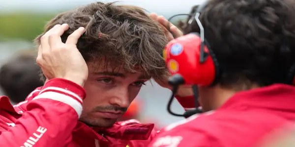 Leclerc Defends Elkann's Comments as Constructive Criticism for Ferrari