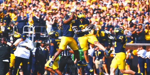 Michigan's Resilience Shines in Critical Victory Over Washington